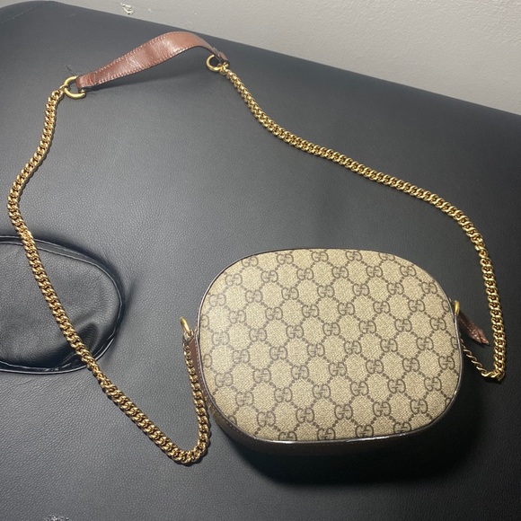 Gucci Handbags - Small Gucci brown purse
